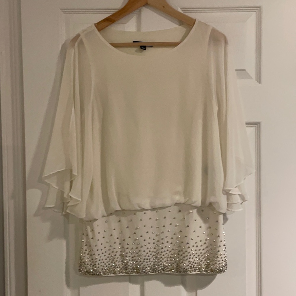Creamy white blouse with beaded bottom